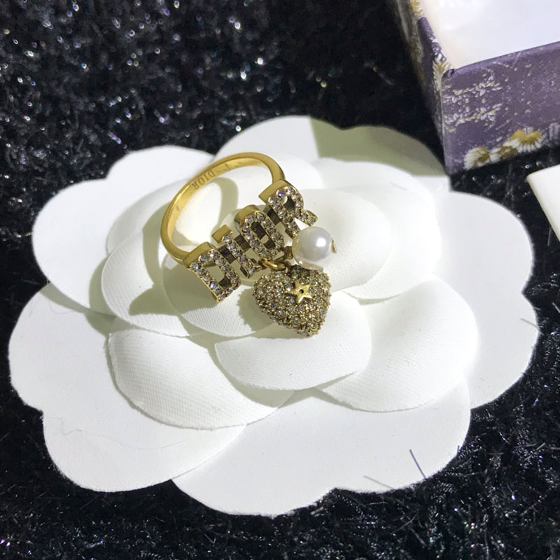 Diorevolution Ring Metal and White Crystals with Resin Pearls Gold